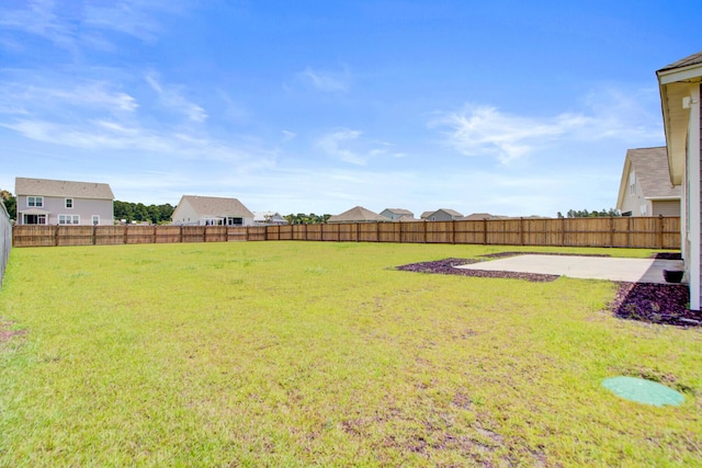 104 Wild Orchid Way, Huger, SC 29450 - fenced backyard featuring a patio