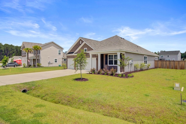 104 Wild Orchid Way, Huger, SC 29450 - view of front facade with driveway and a garage
