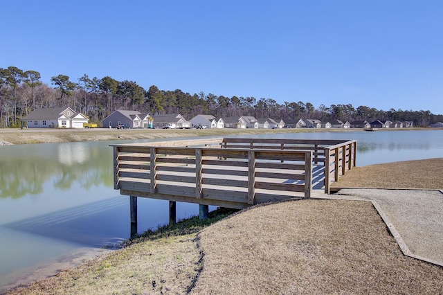 104 Wild Orchid Way, Huger, SC 29450 - dock with a water view and a residential view