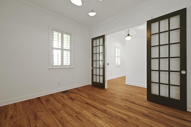 2258 Arthur Gaillard Ln, Charleston, SC 29414 - unfurnished room with crown molding, healthy amount of natural light, and wood finished floors
