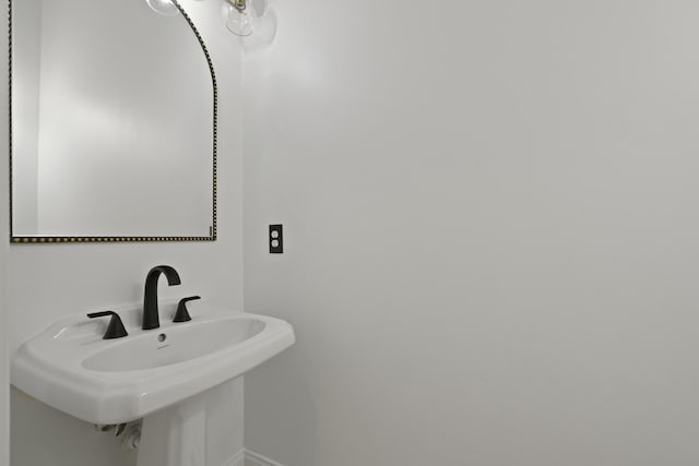 2258 Arthur Gaillard Ln, Charleston, SC 29414 - bathroom featuring a sink and baseboards