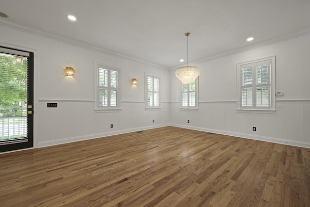 2258 Arthur Gaillard Ln, Charleston, SC 29414 - unfurnished room with ornamental molding, wood finished floors, a wainscoted wall, a chandelier, and recessed lighting