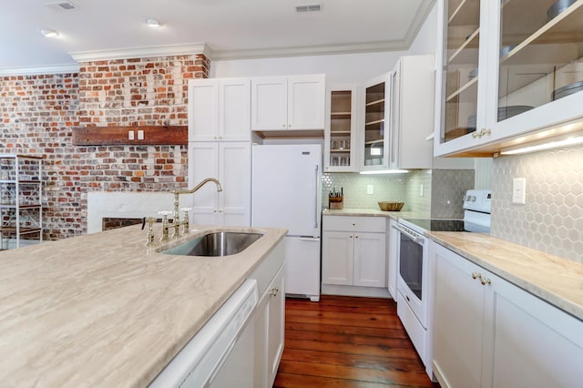 kitchen featuring sink, dark hardwood / wood-style floors, white appliances, and white cabinets