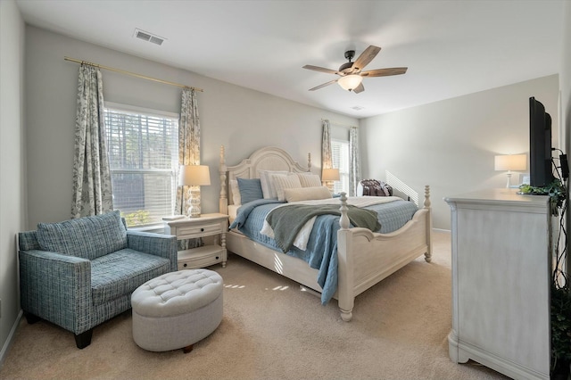 127 Surfbird Rd, Summerville, SC 29486 - bedroom with multiple windows, light carpet, and visible vents