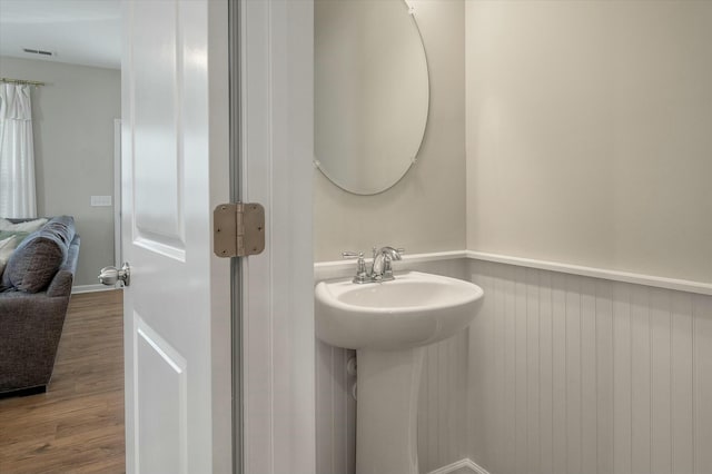 127 Surfbird Rd, Summerville, SC 29486 - bathroom with visible vents, a sink, and wood finished floors