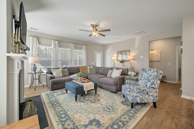 127 Surfbird Rd, Summerville, SC 29486 - living room featuring ceiling fan, baseboards, visible vents, and wood finished floors