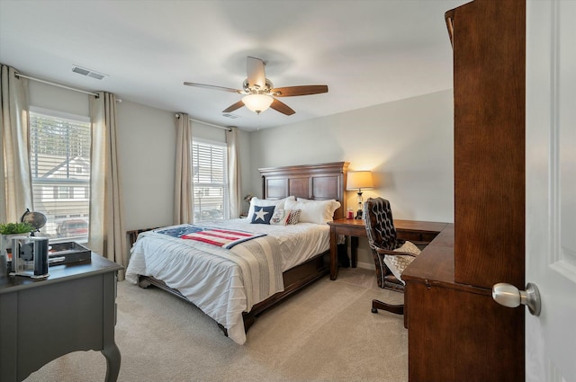 127 Surfbird Rd, Summerville, SC 29486 - bedroom with light colored carpet, a ceiling fan, visible vents, and multiple windows