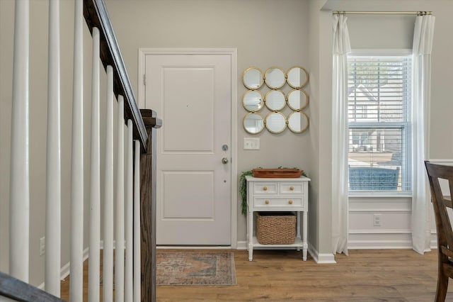 127 Surfbird Rd, Summerville, SC 29486 - entryway with baseboards, a healthy amount of sunlight, and wood finished floors