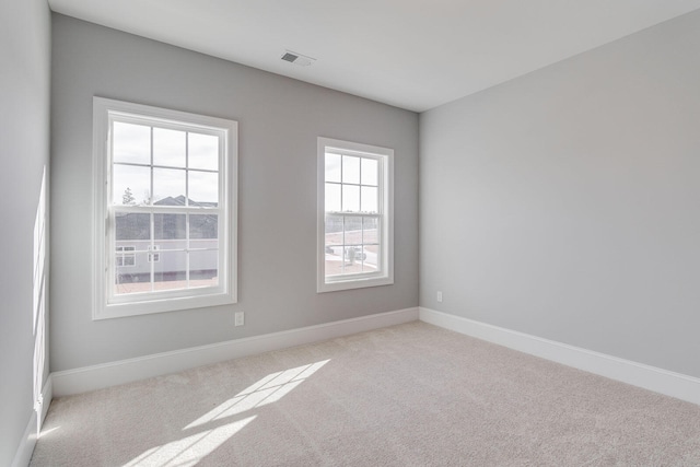 empty room with light carpet