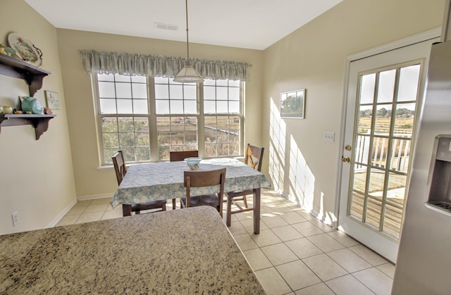 view of tiled dining area