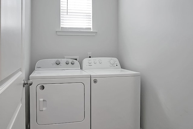 laundry room featuring laundry area and separate washer and dryer