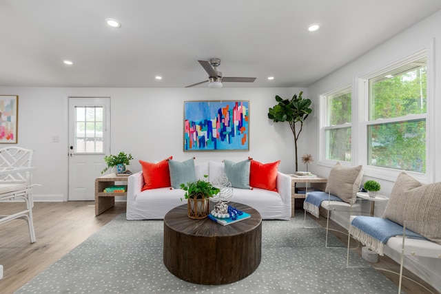 living room with baseboards, recessed lighting, wood finished floors, and ceiling fan