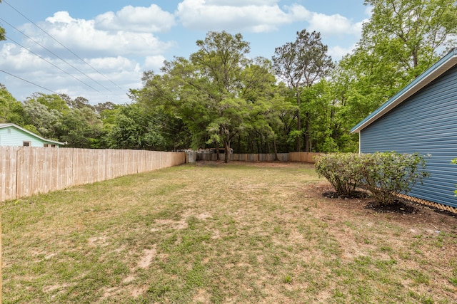 view of yard featuring fence