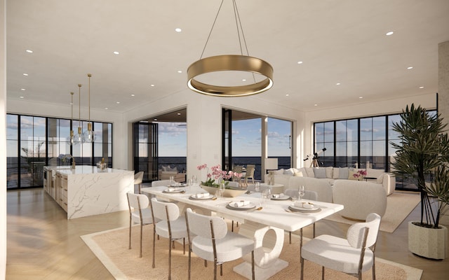 dining room with recessed lighting and light wood finished floors