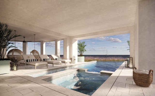 view of pool with a patio area and an in ground hot tub