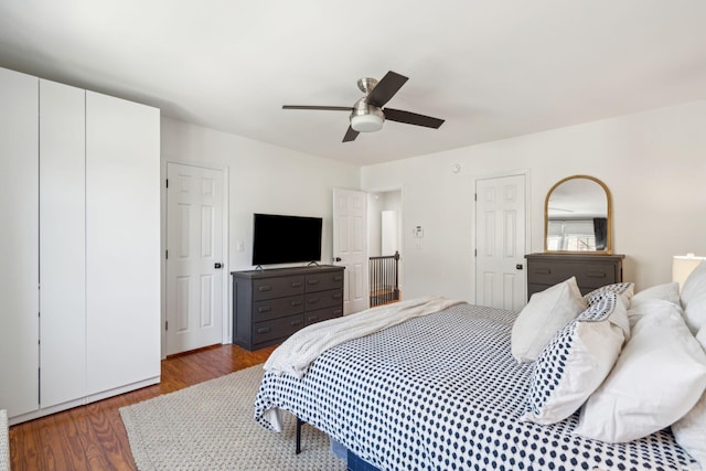 bedroom featuring dark wood-type flooring and ceiling fan