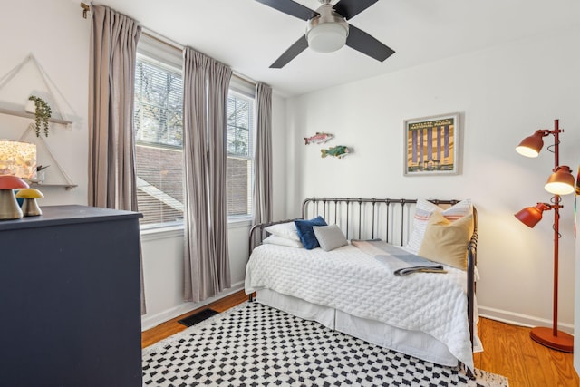 bedroom featuring ceiling fan and light wood-type flooring