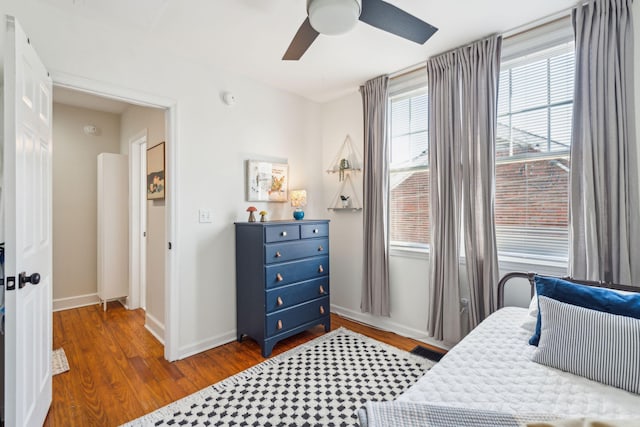 bedroom featuring ceiling fan and hardwood / wood-style floors