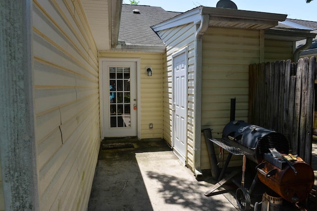 7947 Vermont Rd, North Charleston, SC 29418 - view of exterior entry featuring a shingled roof