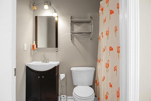 7947 Vermont Rd, North Charleston, SC 29418 - full bath featuring vanity, toilet, a shower with shower curtain, and baseboards