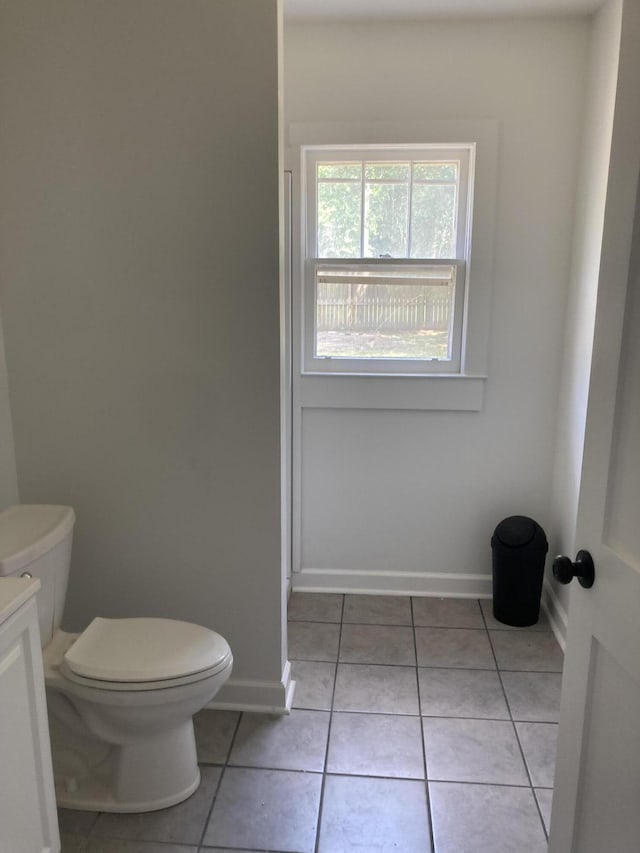 110 Groves St, Walterboro, SC 29488 - bathroom with toilet, tile patterned floors, and baseboards