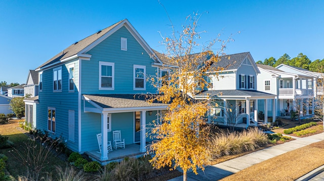 view of property featuring a porch