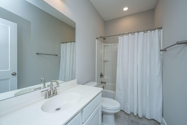 full bathroom with tile patterned floors, vanity, toilet, and shower / bathtub combination with curtain