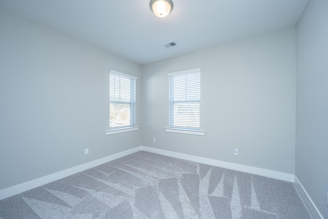 view of carpeted spare room