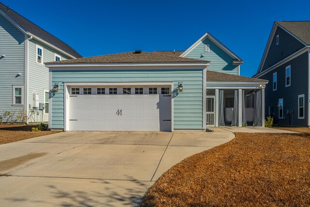 view of front of home with a garage