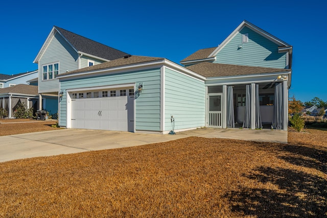 view of front of property with a garage