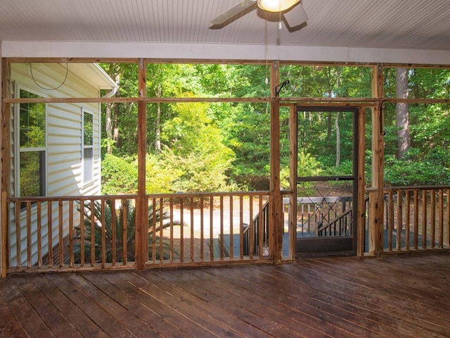 exterior space featuring ceiling fan