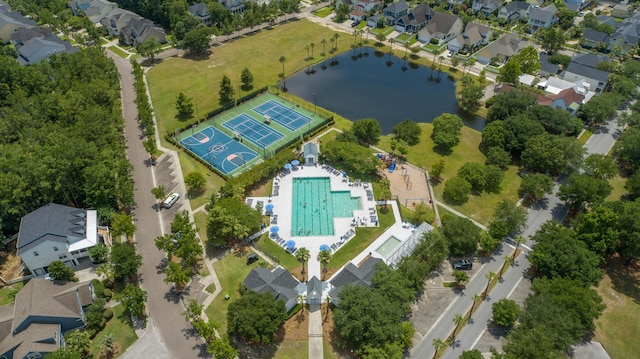 bird's eye view with a water view