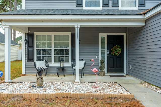 doorway to property featuring a porch