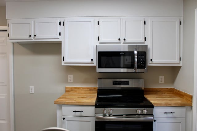 kitchen featuring white cabinets and stainless steel appliances