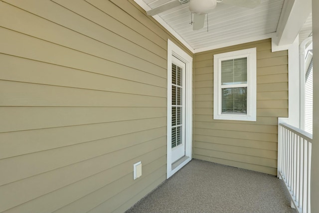 exterior space featuring ceiling fan