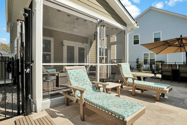 view of patio / terrace featuring fence