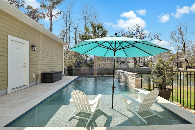 view of swimming pool featuring a patio area, a fenced in pool, outdoor dry bar, and fence