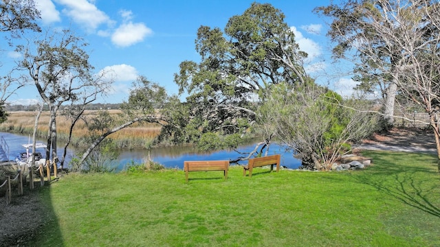 exterior space with a water view