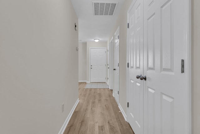 hall featuring light hardwood / wood-style floors