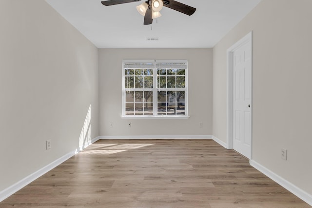 unfurnished room featuring ceiling fan and light hardwood / wood-style floors