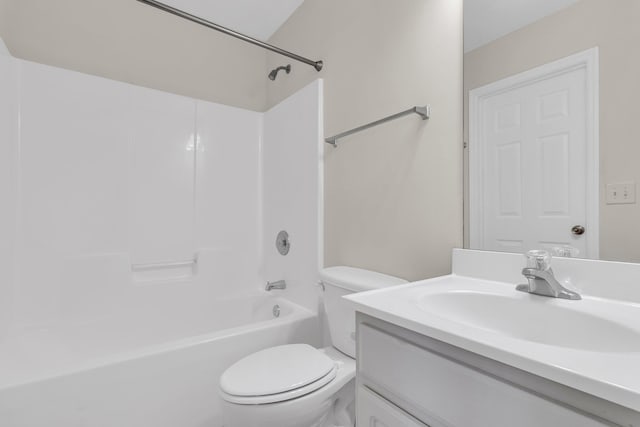 full bathroom with bathing tub / shower combination, vanity, and toilet