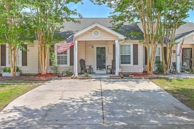 8028 Vermont Rd, North Charleston, SC 29418 - view of front of home with a porch and a shingled roof