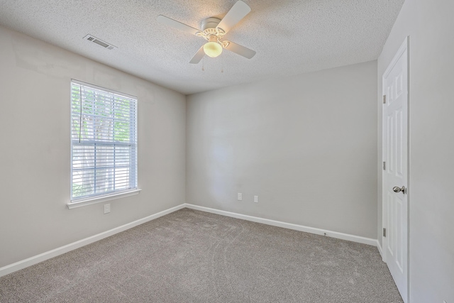 8028 Vermont Rd, North Charleston, SC 29418 - empty room with ceiling fan, a textured ceiling, carpet, and baseboards