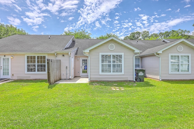 8028 Vermont Rd, North Charleston, SC 29418 - rear view of house featuring a patio area, a yard, and roof with shingles