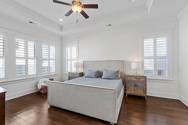 bedroom with ceiling fan, dark hardwood / wood-style floors, and ornamental molding