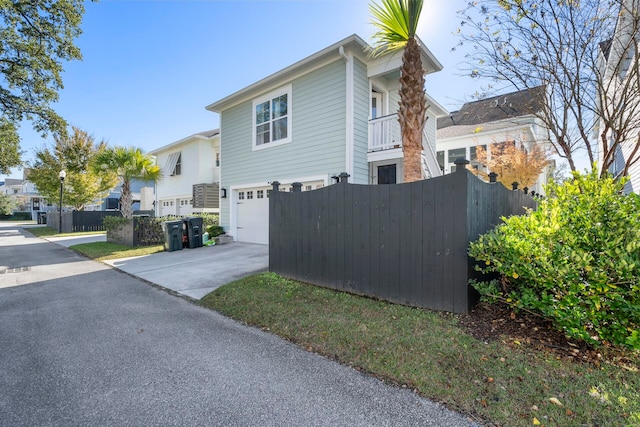 view of property exterior with a garage