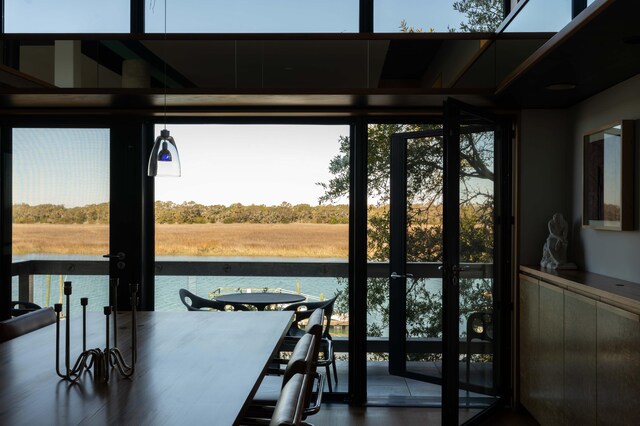 905 Palm Blvd, Isle Of Palms, SC 29451 - dining room featuring healthy amount of natural light and a water view