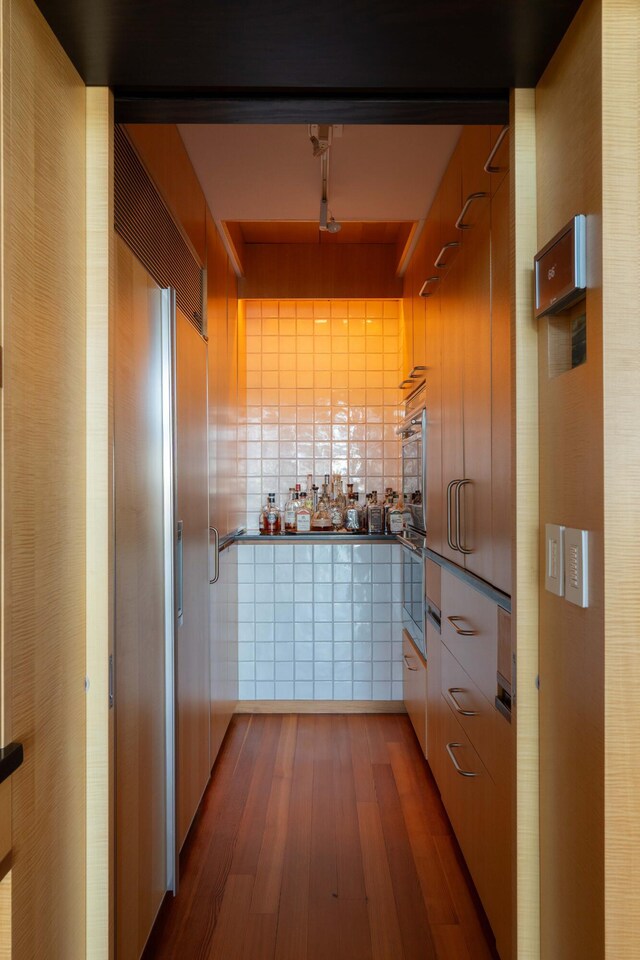 905 Palm Blvd, Isle Of Palms, SC 29451 - hallway with wood finished floors and track lighting