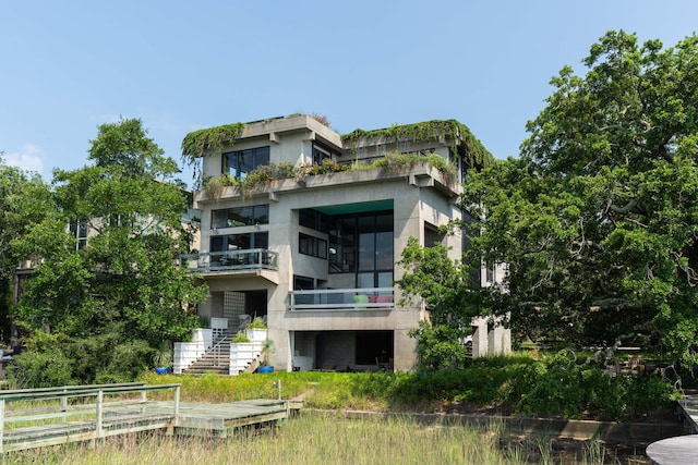 905 Palm Blvd, Isle Of Palms, SC 29451 - rear view of property featuring stairs, a balcony, and stucco siding