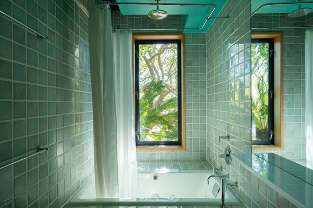 905 Palm Blvd, Isle Of Palms, SC 29451 - bathroom with shower / bath combo and tile walls